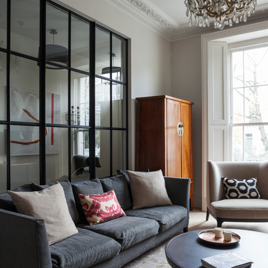 grey living room with glass panelled wall living room